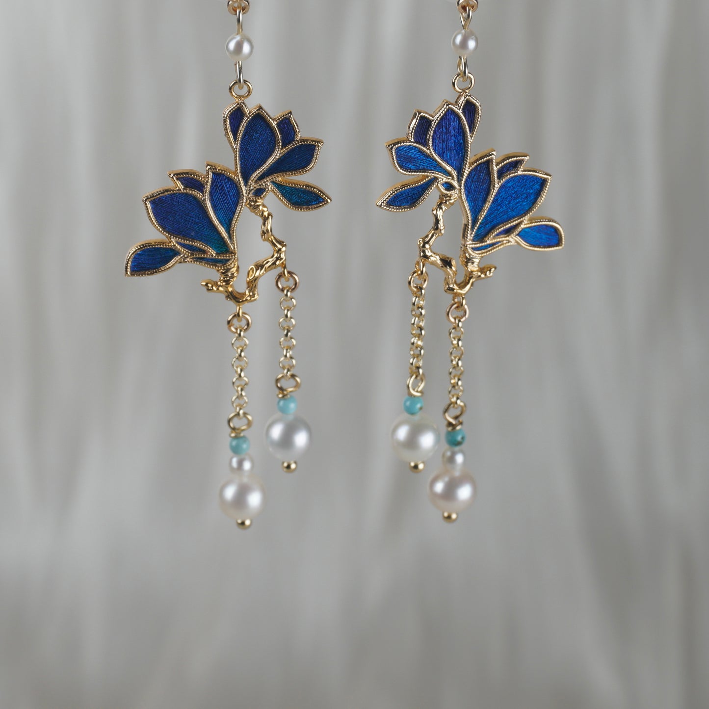 Peacock Feather Magnolia Blossom Earrings