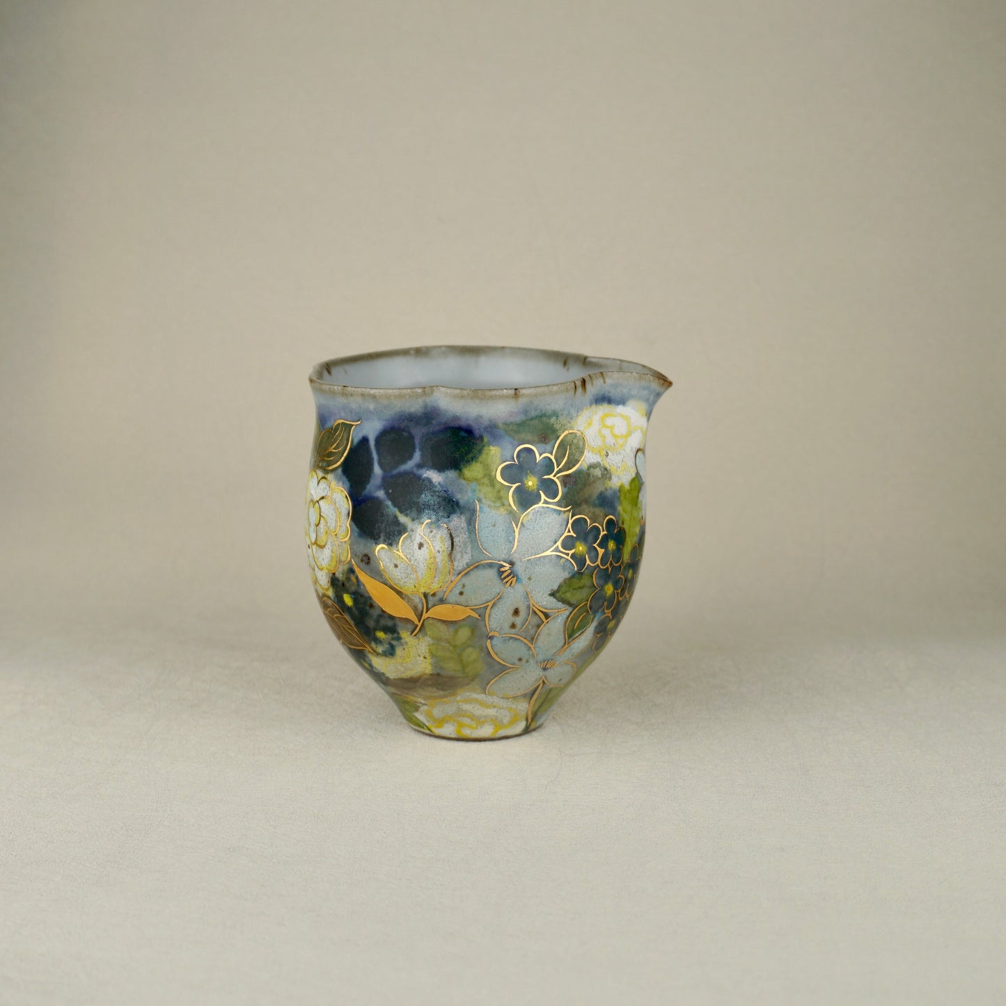 White And Yellow Tea Pitcher