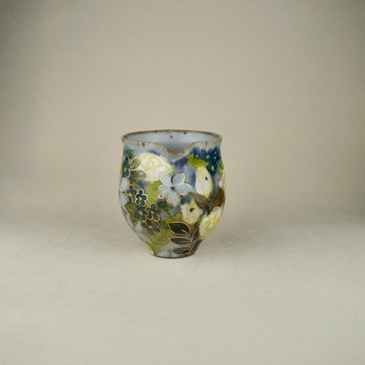 White And Yellow Tea Pitcher