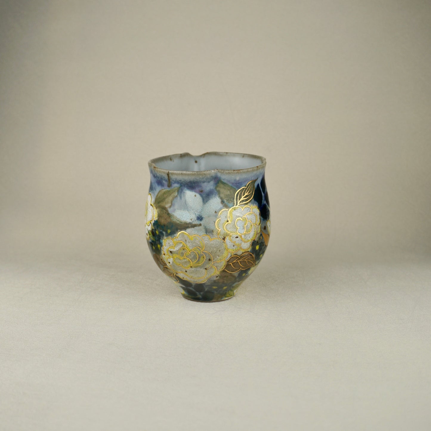 White And Yellow Tea Pitcher