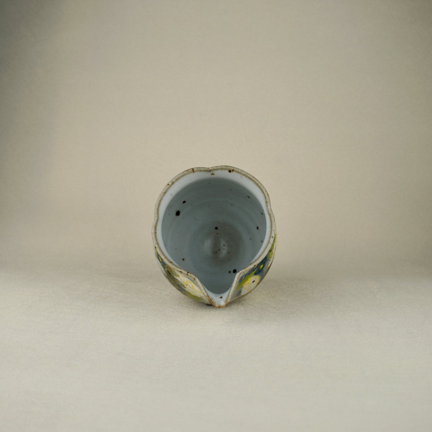 White And Yellow Tea Pitcher