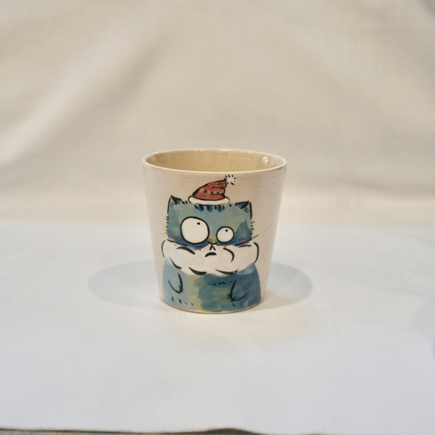 Ceramic Mug with Christmas cat wearing a cosy scarf