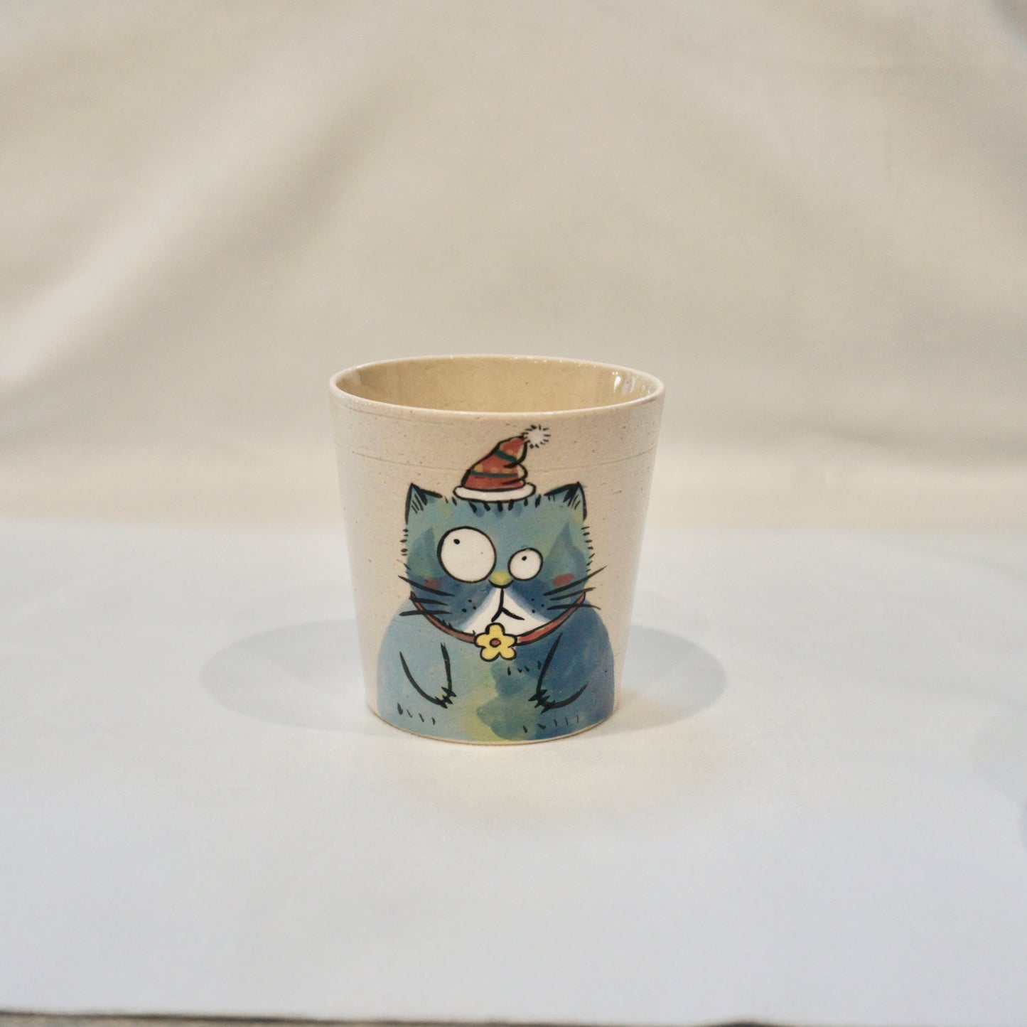 Ceramic Mug with Christmas cat and daisy