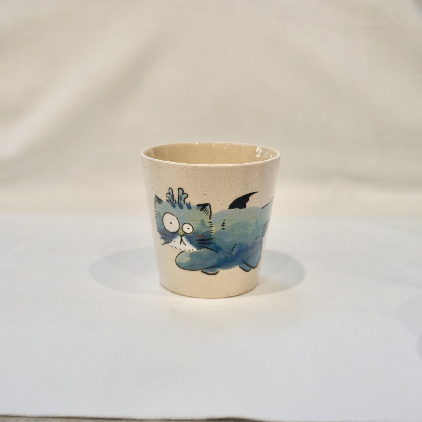 Ceramic mug with cat dragon wings