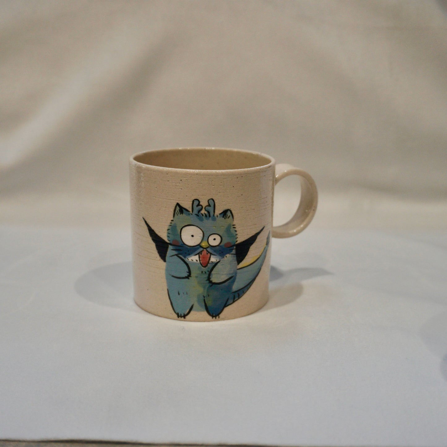 Ceramic mug with cat