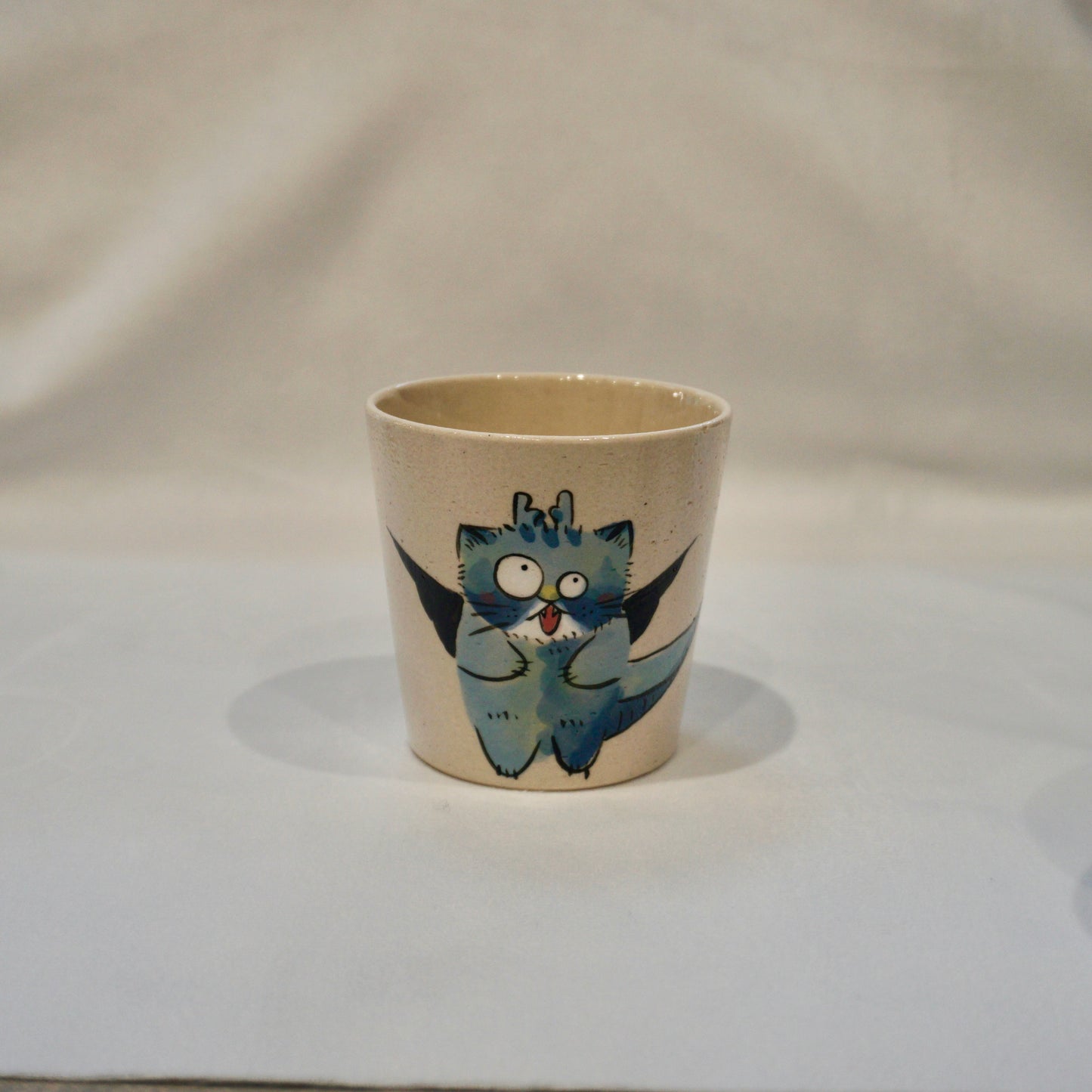 Ceramic mug with cat